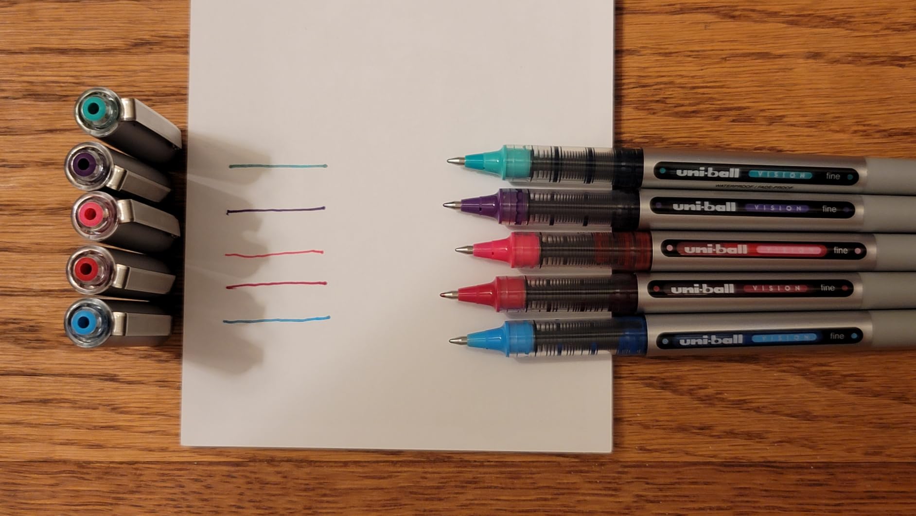 uni-ball Vision Stick Roller Ball Pens, Fine Point, Black Ink, Pack of 4 customer photo 2