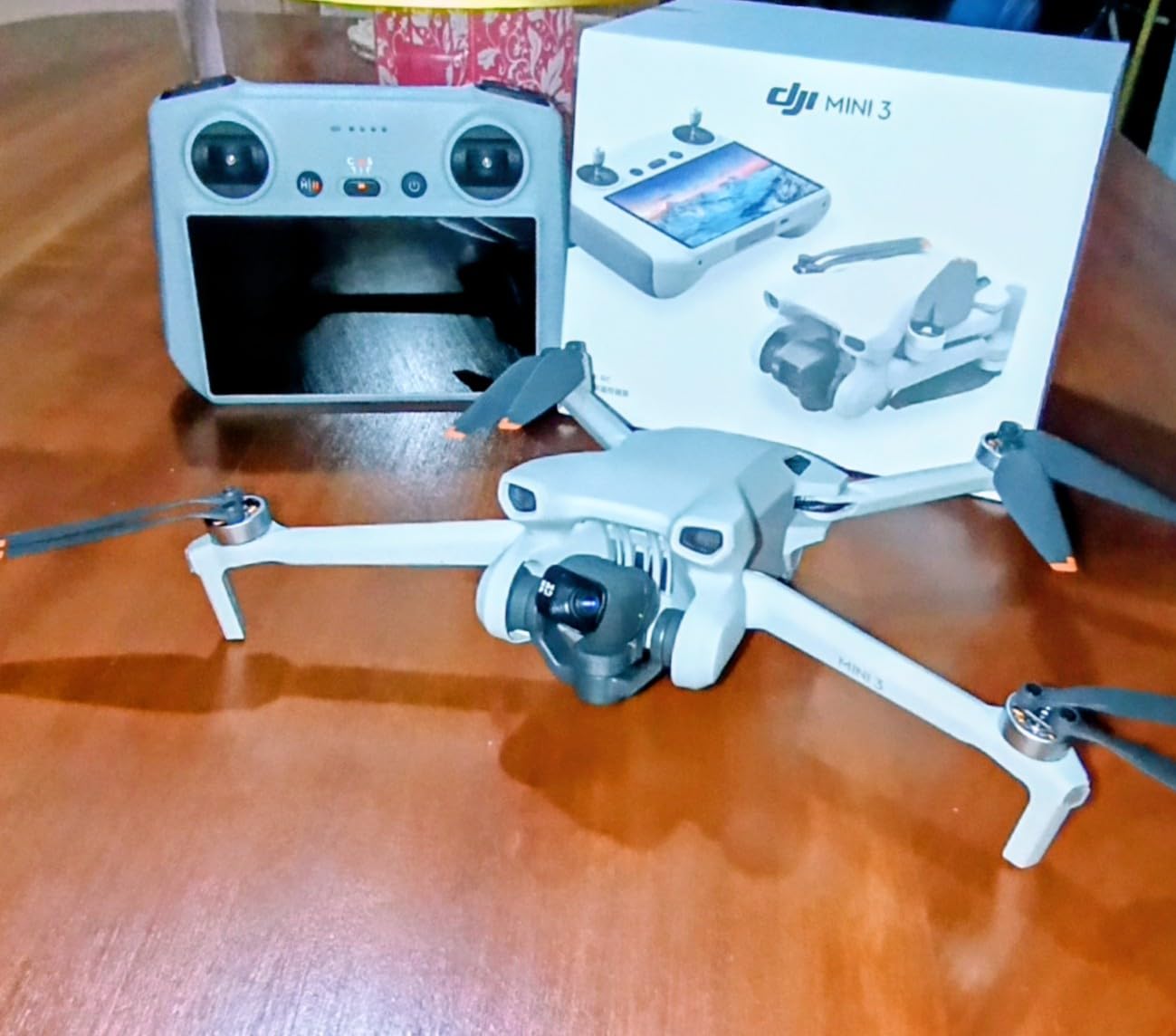 DJI Mini 3 With DJI RC, 3-Axis Mechanical Gimbal Mini Camera Drone, 4K HDR Video, 38-Min Flight Time, up to 32800ft (10km) Video Transmission, Vertical Shooting, GPS Auto Return customer photo 1