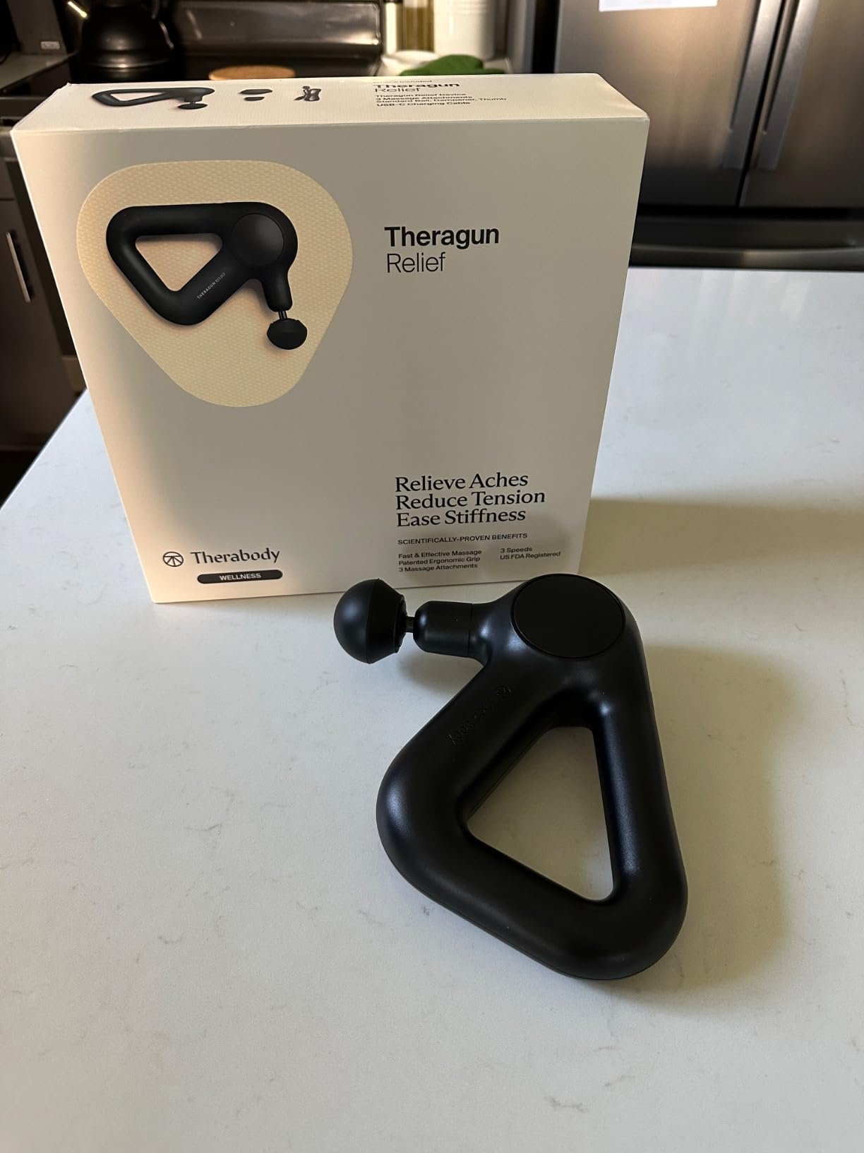 TheraGun Therabody Relief Massage Gun | for Daily Comfort | 3-Speed | Black | Quiet Handheld Percussion Muscle Massager for Back, Leg & Shoulder Pain Relief customer photo 2