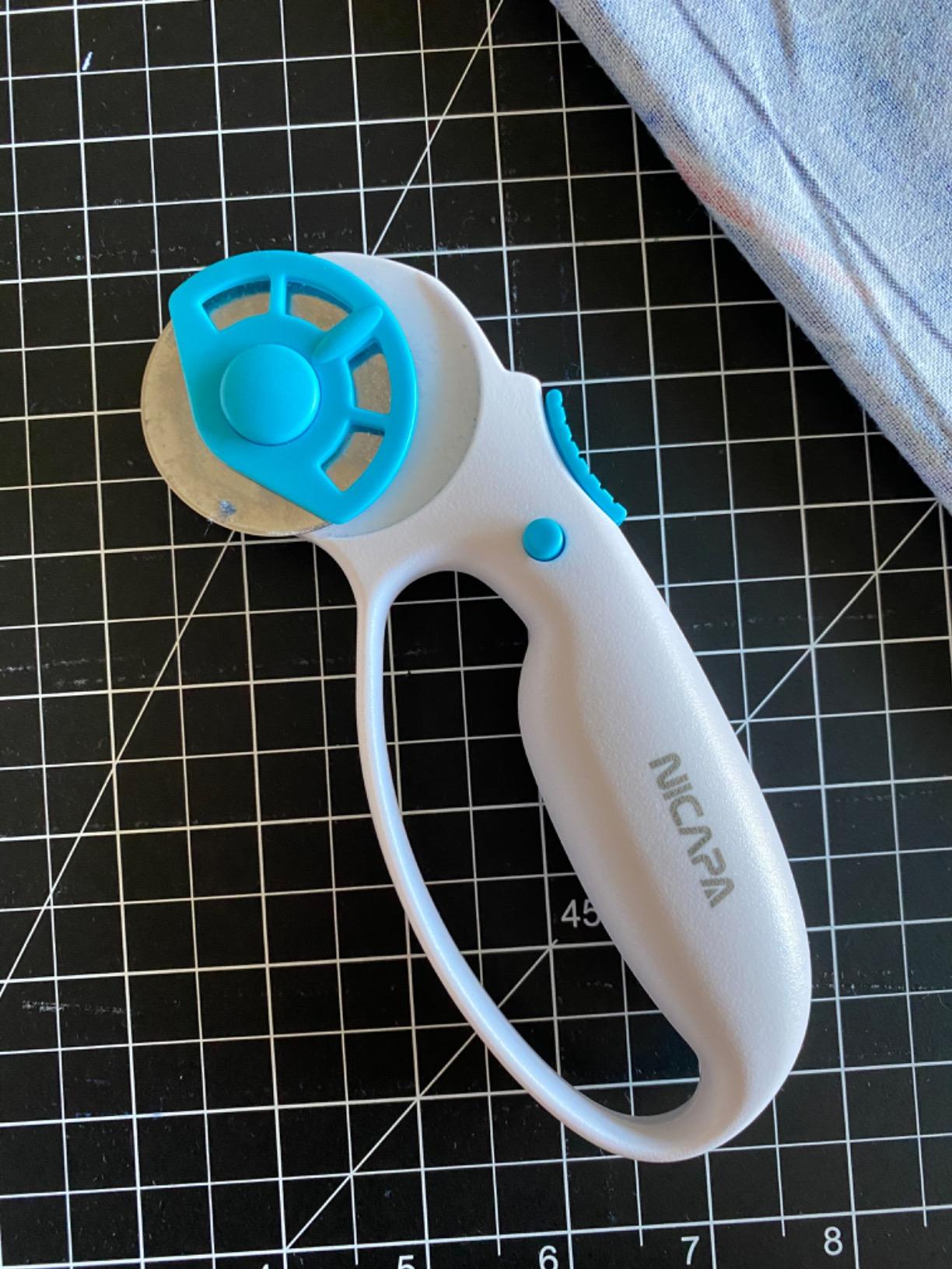 NICAPA 45mm Rotary Cutter for Fabric with Safety Lock Ergonomic Classic Comfort Loop Rotary Cutter for Crafting Sewing Quilting (Extra 5pcs 45mm Replacement Blades Included) customer photo 1